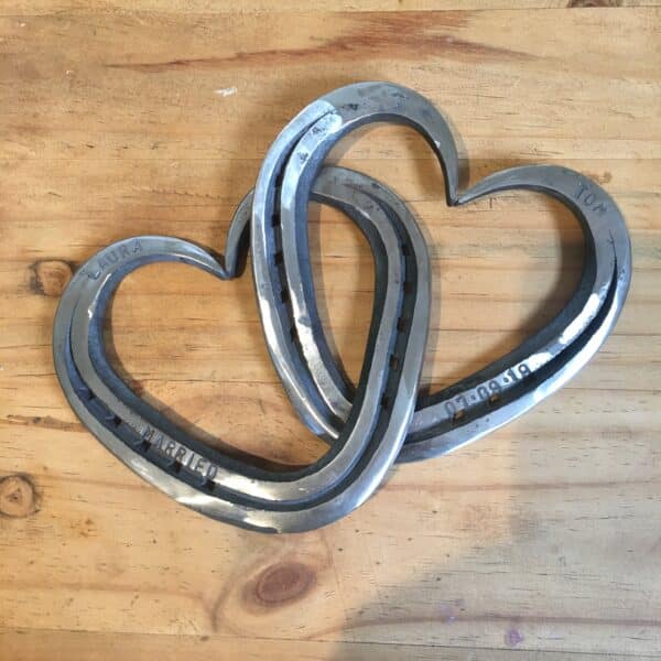 interlinked hand forged steel hearts